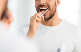 Gently brush your teeth at least twice a day.